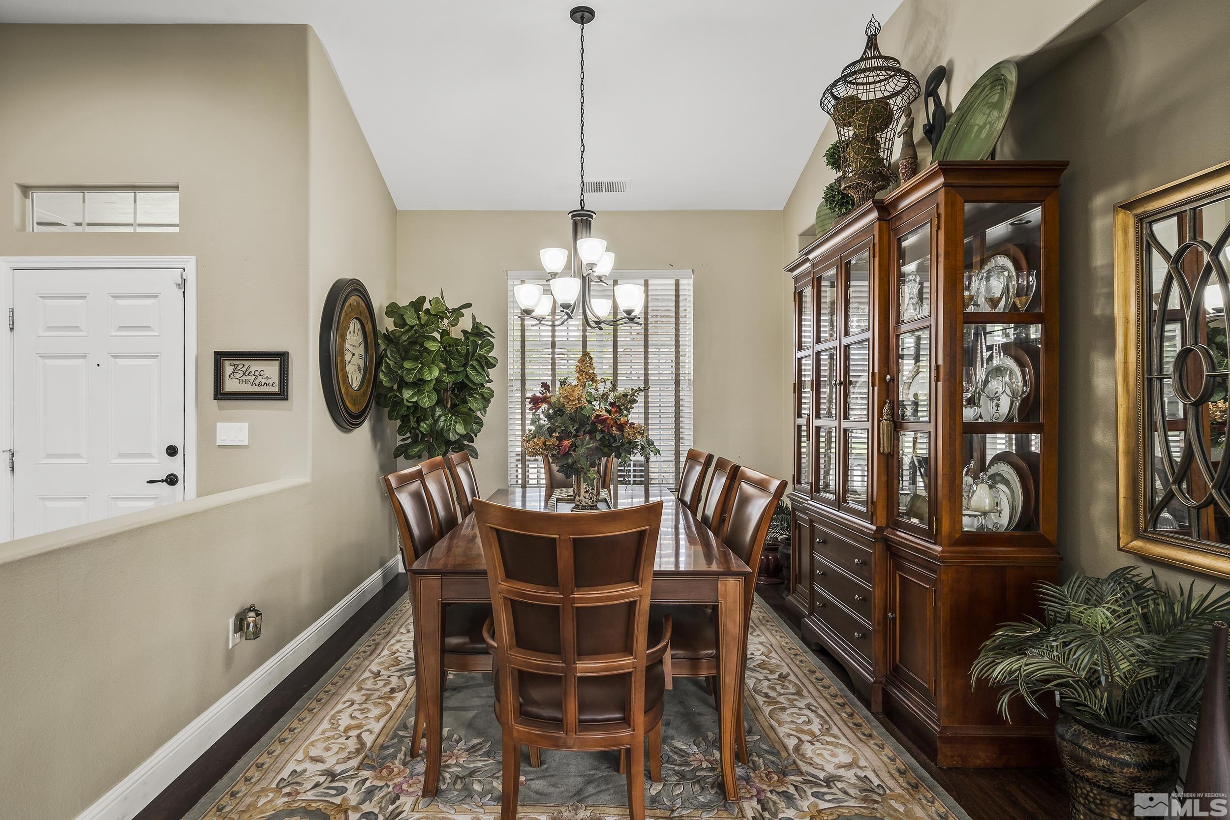 1484 Gaucho Lane Reno, NV 89521 - Photo 17 of 37 a view of a dining room with furniture and window