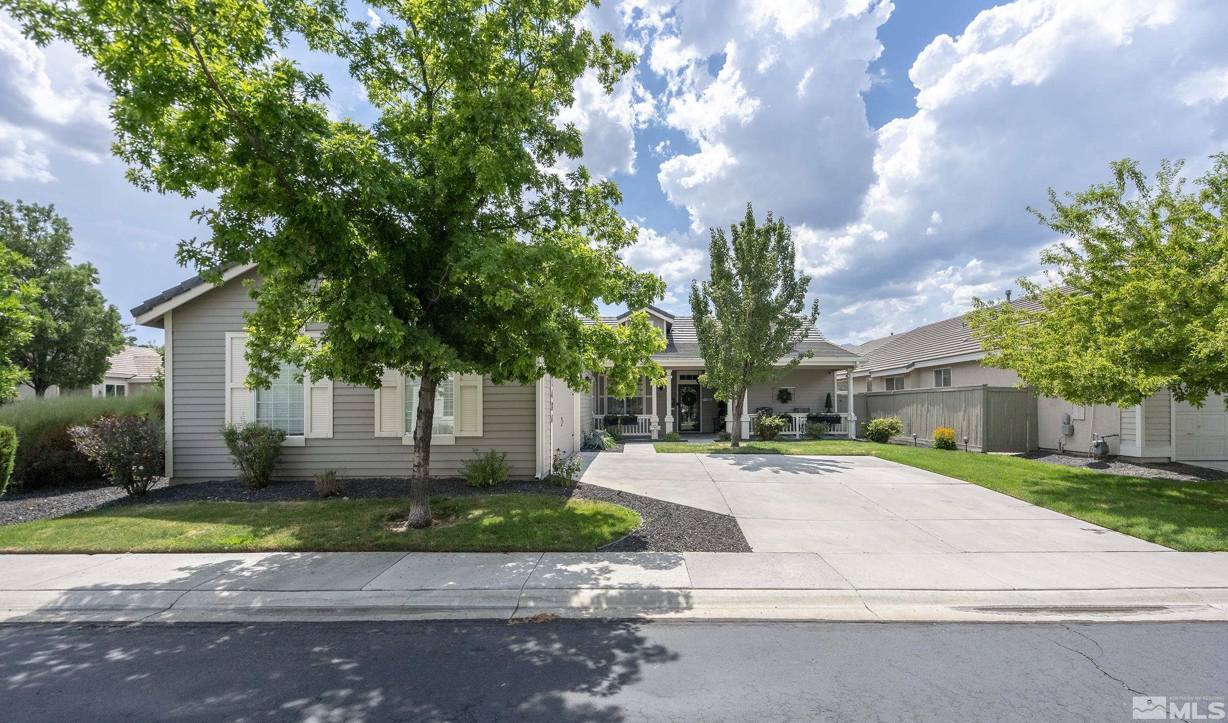 1484 Gaucho Lane Reno, NV 89521 - Photo 33 of 37 a front view of a house with garden
