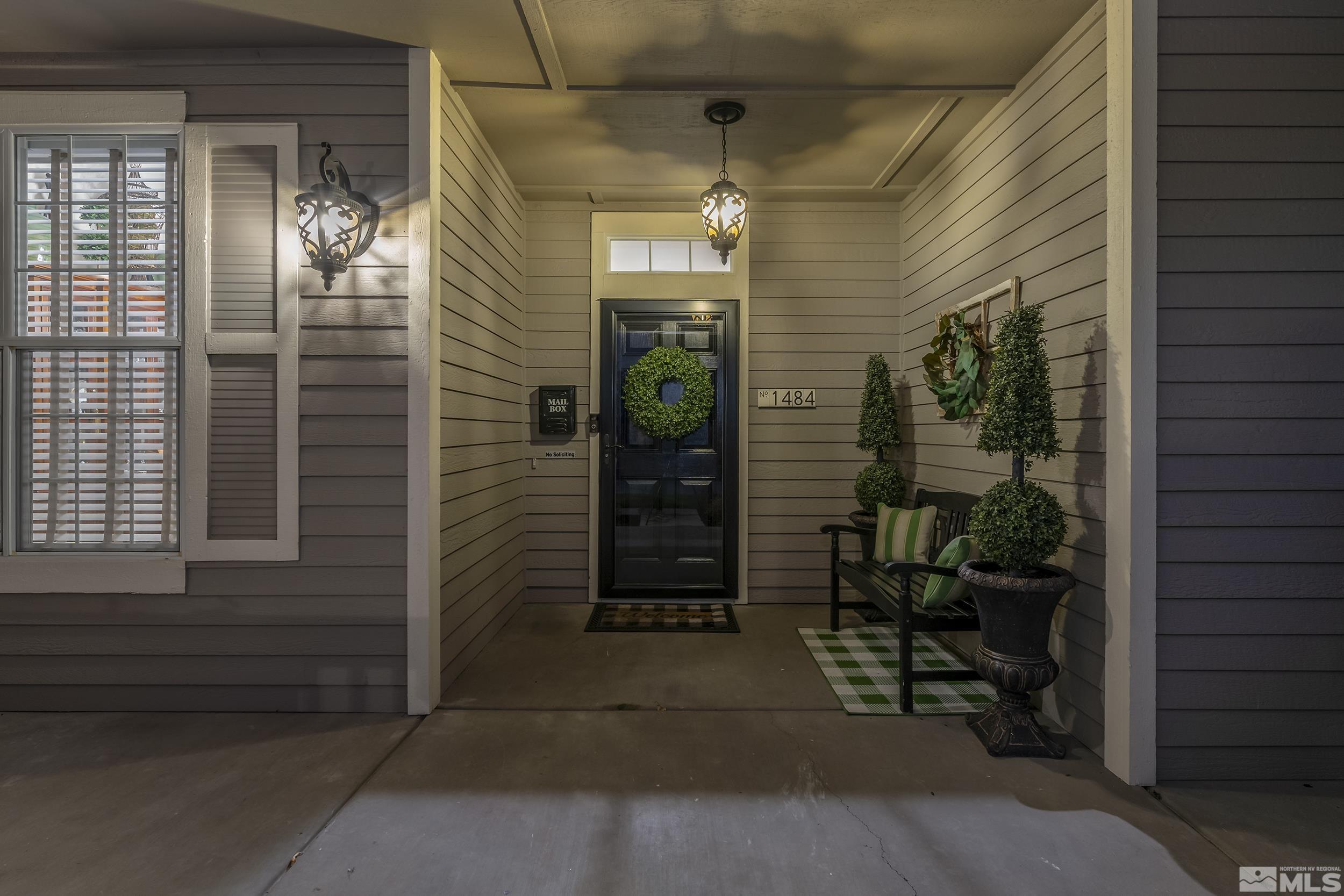 1484 Gaucho Lane Reno, NV 89521 - Photo 4 of 37 a view of a door of a house with a porch