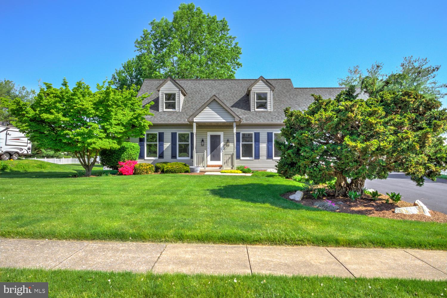 706 Rosemont Drive Lititz, PA 17543 - Photo 1 of 42 Charming home with lush greenery.