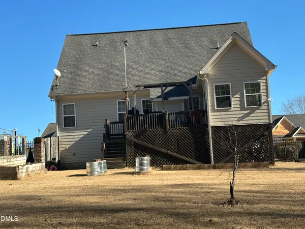 a front view of a house with garage