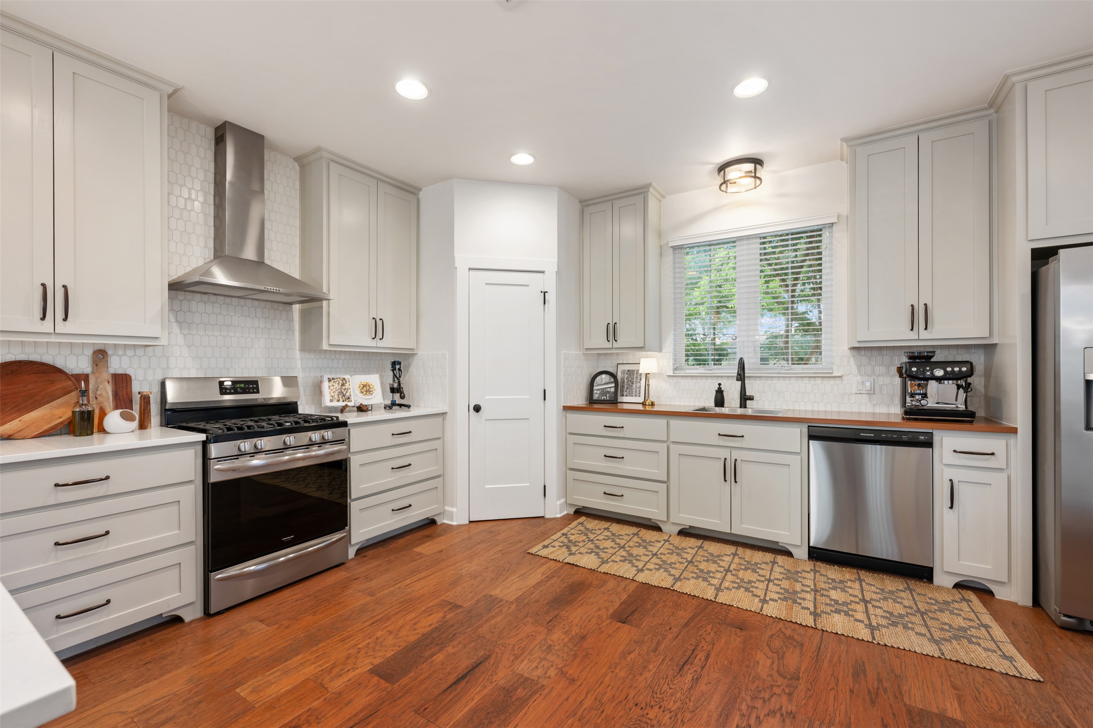 1301 West Street Georgetown, TX 78626 - Photo 12 of 40 Culinary creations come to life in this kitchen, featuring ample cabinetry and a practical layout.