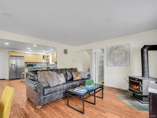 a view of a livingroom with furniture and a flat screen tv