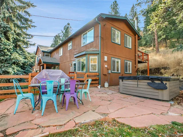 a view of outdoor space yard deck patio and fire pit