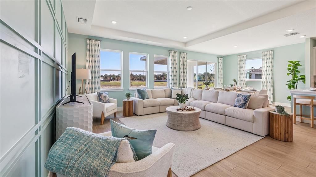4216 Southwest 52nd Lane Road Ocala, FL 34474 - Photo 13 of 48 a living room with furniture and a large window