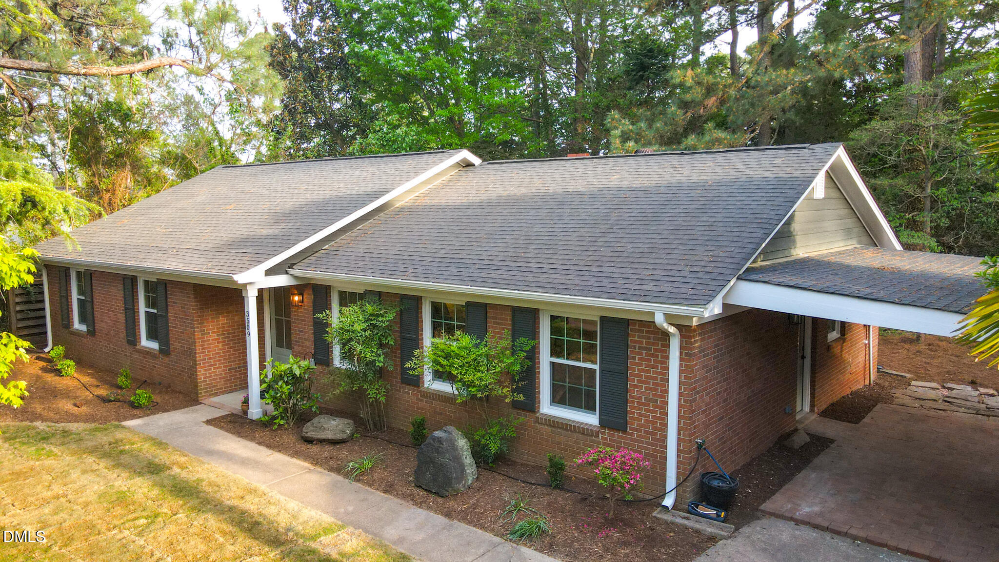 3509 Morningside Drive Raleigh, NC 27607 - Photo 46 of 49 a view of a house with a yard plants and large tree