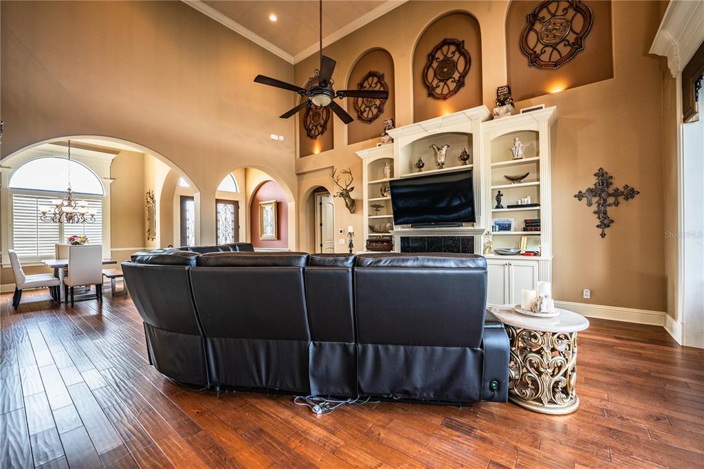6739 Eagle Ridge Boulevard Lakeland, FL 33813 - Photo 15 of 54 a view of a fireplace with wooden floor