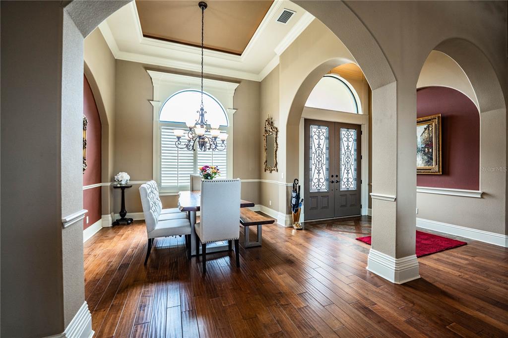 6739 Eagle Ridge Boulevard Lakeland, FL 33813 - Photo 20 of 54 a view of a livingroom with furniture window and wooden floor