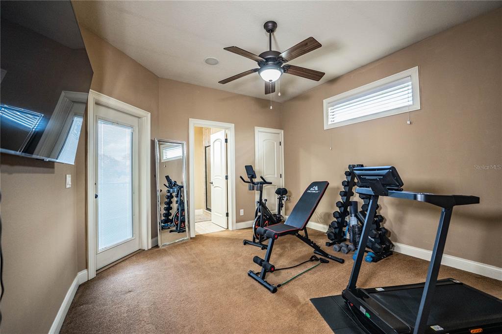 6739 Eagle Ridge Boulevard Lakeland, FL 33813 - Photo 35 of 54 a view of a workspace with furniture and a window