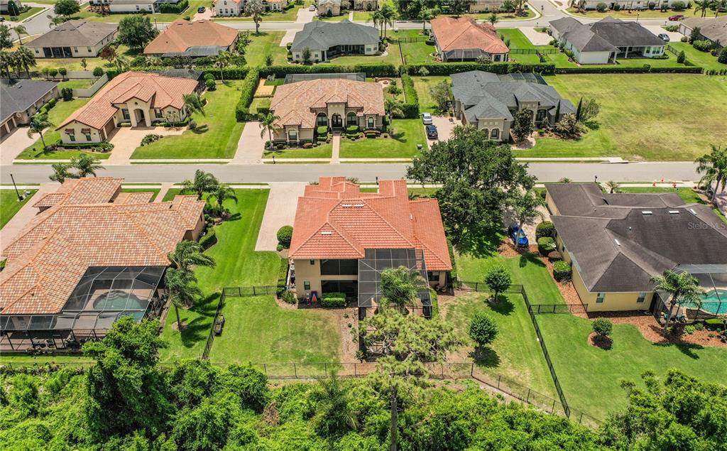 6739 Eagle Ridge Boulevard Lakeland, FL 33813 - Photo 45 of 54 an aerial view of house with yard swimming pool and outdoor seating