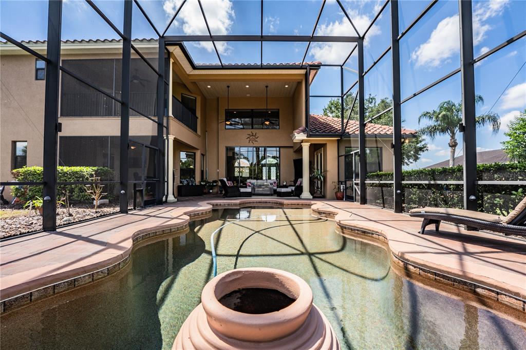 6739 Eagle Ridge Boulevard Lakeland, FL 33813 - Photo 51 of 54 a view of a house with a swimming pool
