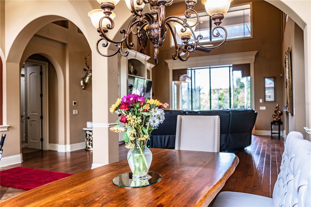 6739 Eagle Ridge Boulevard Lakeland, FL 33813 - Photo 7 of 54 a view of a dining room with furniture window and wooden floor