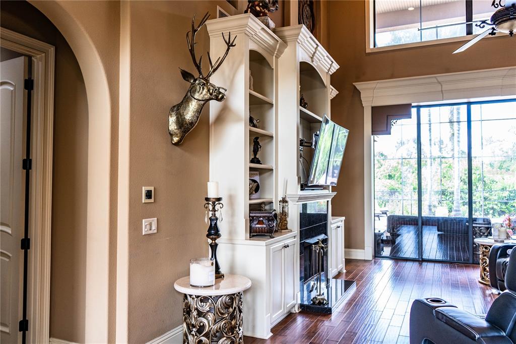 6739 Eagle Ridge Boulevard Lakeland, FL 33813 - Photo 8 of 54 a view of livingroom with furniture wooden floor and windows
