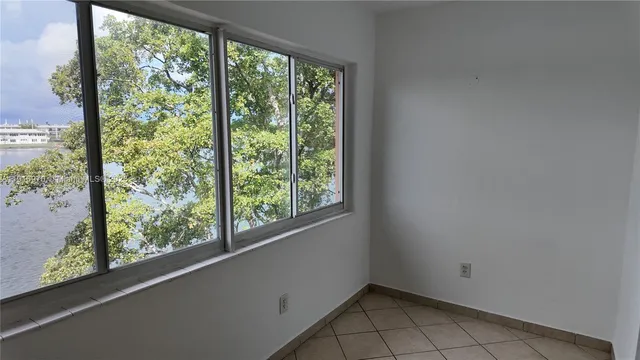 a view of a room that has a window