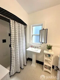 a kitchen with a stove and a microwave