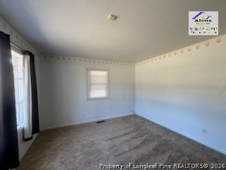 338 Summerhill Road Fayetteville, NC 28303 - Photo 24 of 28 an empty room with a empty space and window