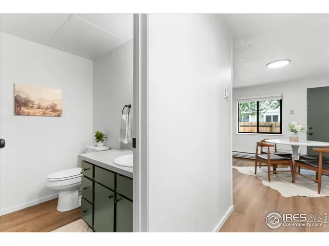 a workspace with furniture and window