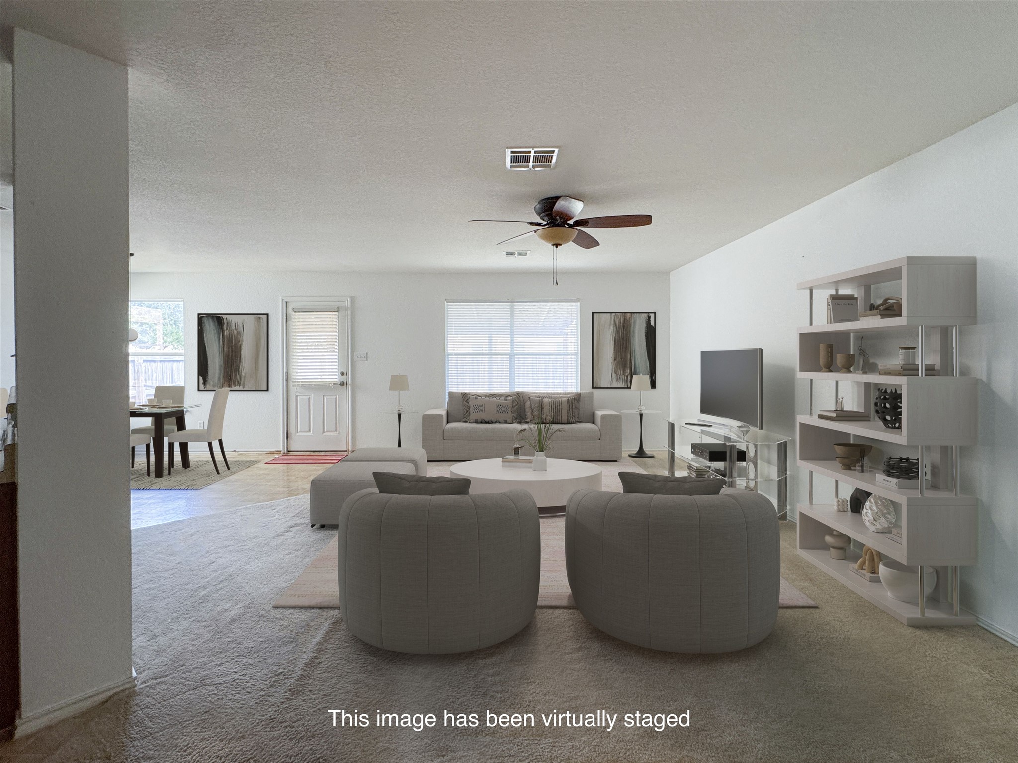 18420 Wind Tree Lane Elgin, TX 78621 - Photo 4 of 15 a living room with furniture a flat screen tv and a window
