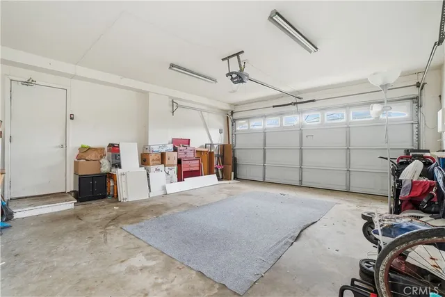 a view of a garage with storage