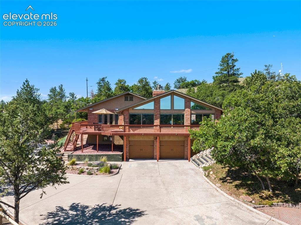 8020 Westwood Road Colorado Springs, CO 80919 - Photo 2 of 50 Gorgeous 2+ car attached and a 2+ car detached -- best of both worlds.