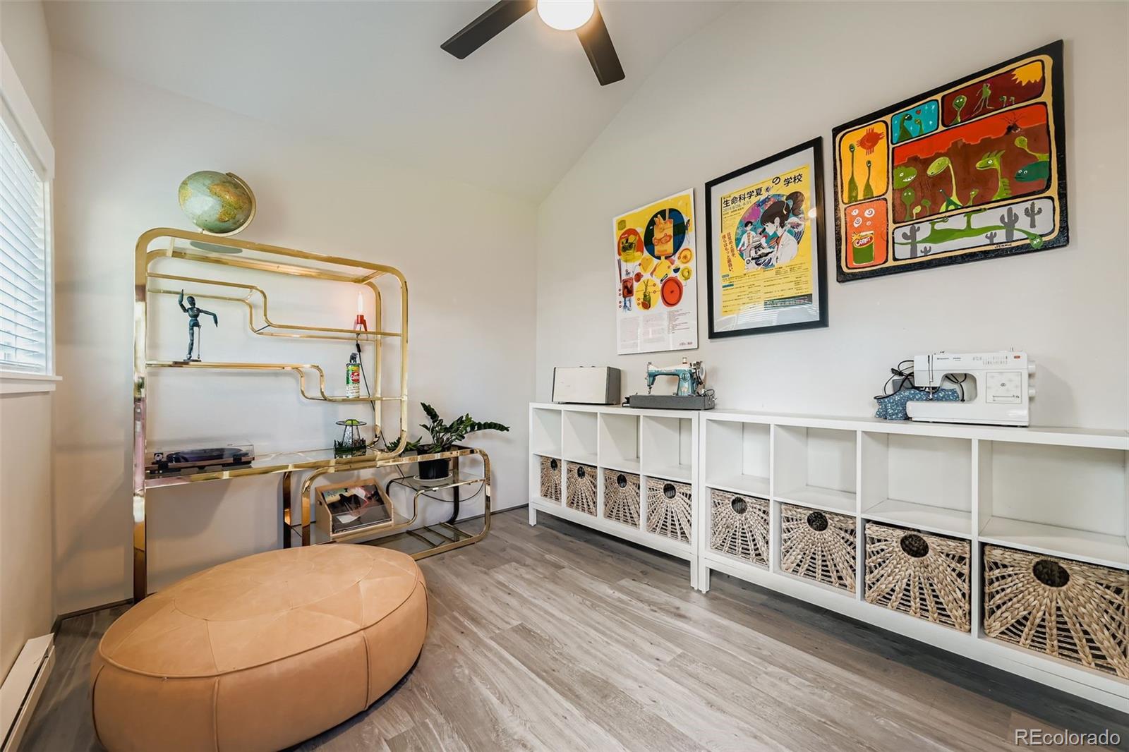 845 Martin Street Longmont, CO 80501 - Photo 11 of 18 a view of a workspace with furniture
