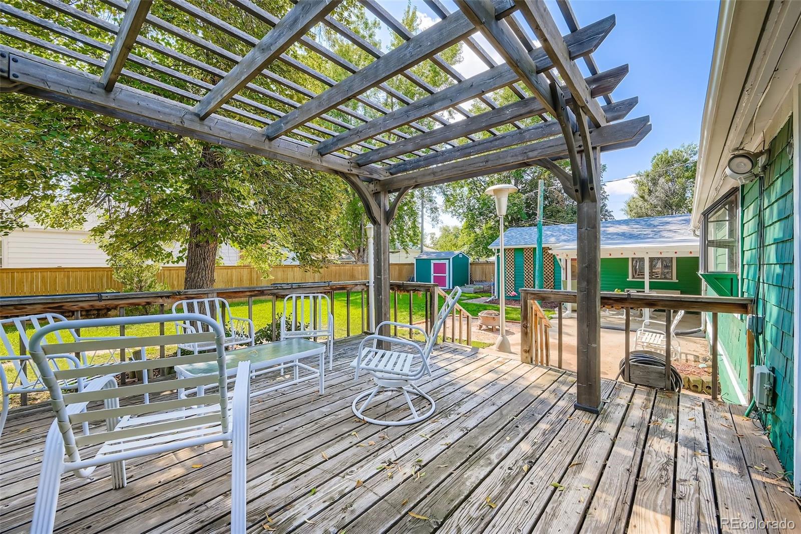 845 Martin Street Longmont, CO 80501 - Photo 12 of 18 a view of a swimming pool with a patio