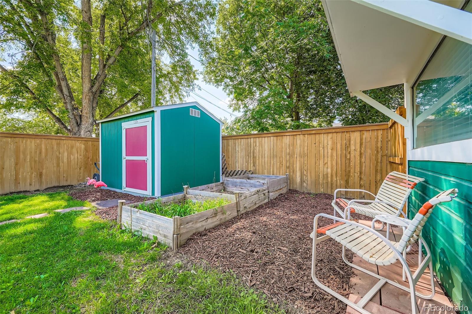 845 Martin Street Longmont, CO 80501 - Photo 14 of 18 a backyard of a house with seating space
