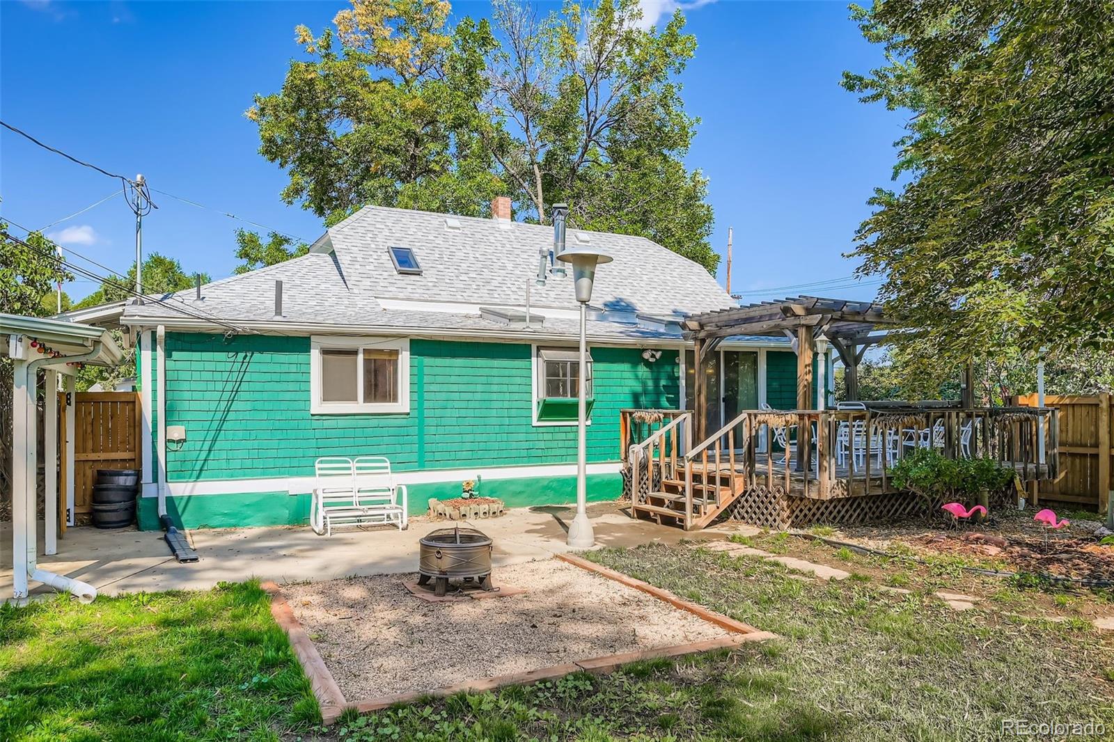 845 Martin Street Longmont, CO 80501 - Photo 15 of 18 a view of a house with backyard and sitting area
