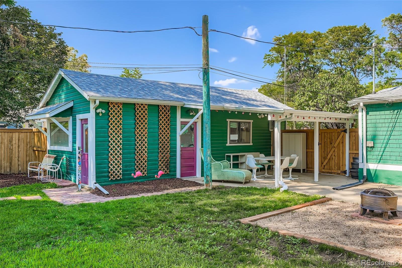 845 Martin Street Longmont, CO 80501 - Photo 16 of 18 a view of a house with yard and sitting area