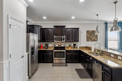 $694,900 | 1414 Moon Valley Drive, Davenport, FL 33896