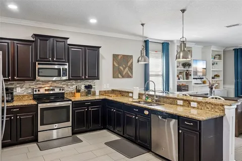 $694,900 | 1414 Moon Valley Drive, Davenport, FL 33896