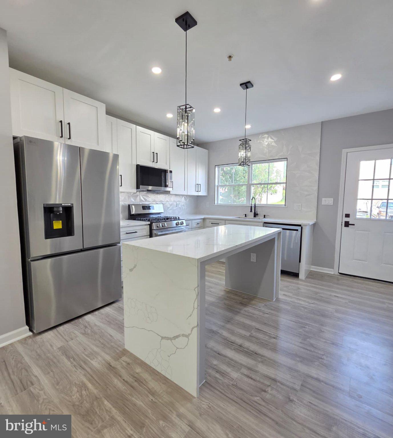 1841 Tubman Road Southeast Washington, DC 20020 - Photo 1 of 6 Modern kitchen with sleek finishes.