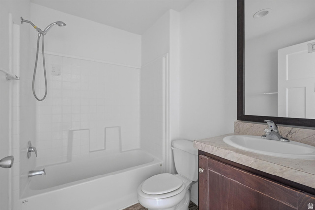 433 North 750 West Logan, UT 84321 - Photo 12 of 40 Full bathroom featuring a white tub and shower combination with a flexible shower head