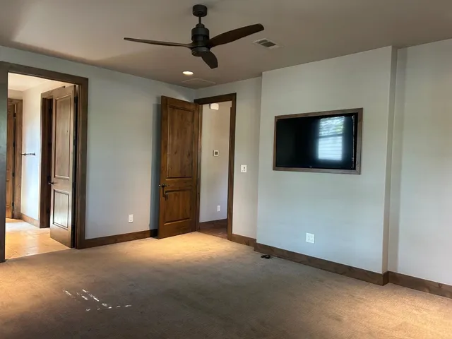 a view of a livingroom with a flat screen tv