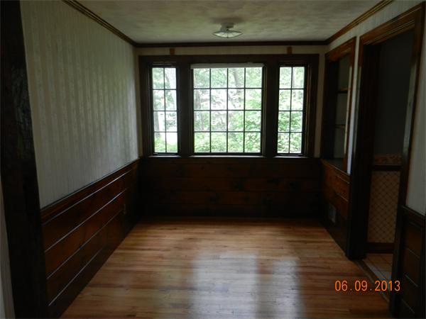 40 Crown Ridge Road Wellesley, MA 02482 - Photo 8 of 9 a view of an empty room with wooden floor and a window