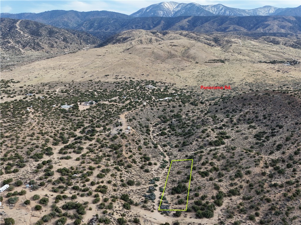 0 195th Road Llano, CA 93544 - Photo 2 of 4 a view of a dry field with mountains in the background