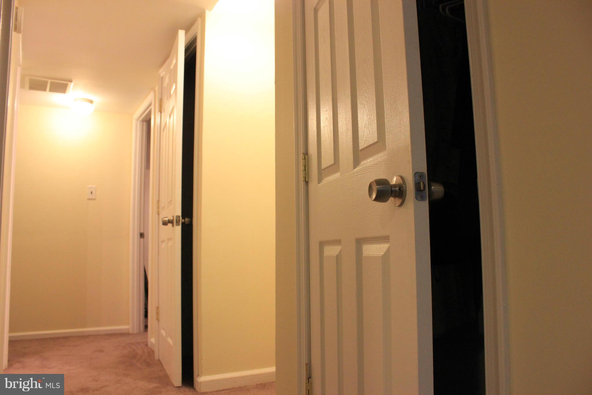 11602 Jester Way Dunkirk, MD 20754 - Photo 11 of 23 a bathroom with a shower and a door