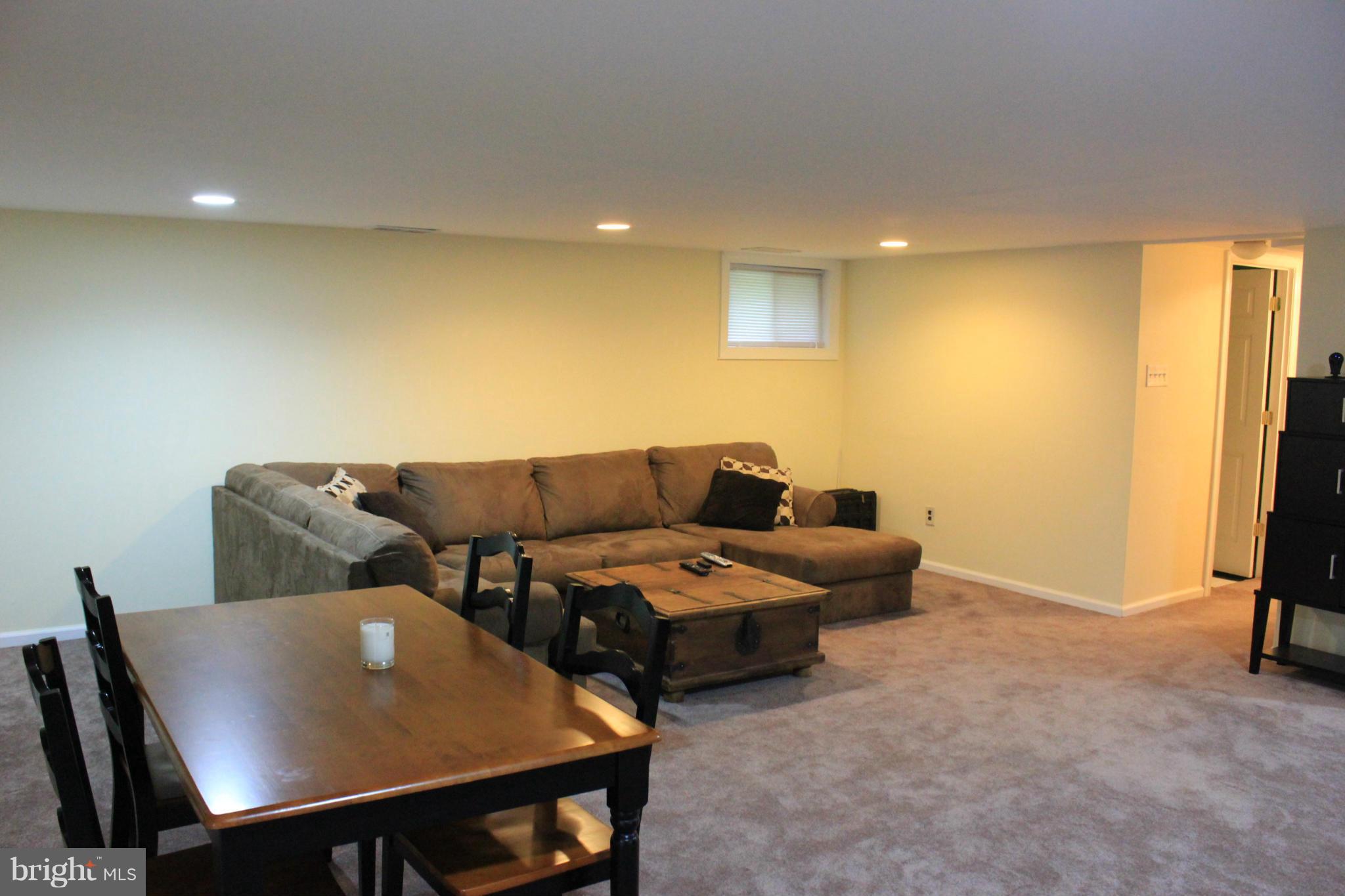 11602 Jester Way Dunkirk, MD 20754 - Photo 12 of 23 a living room with furniture and a couch