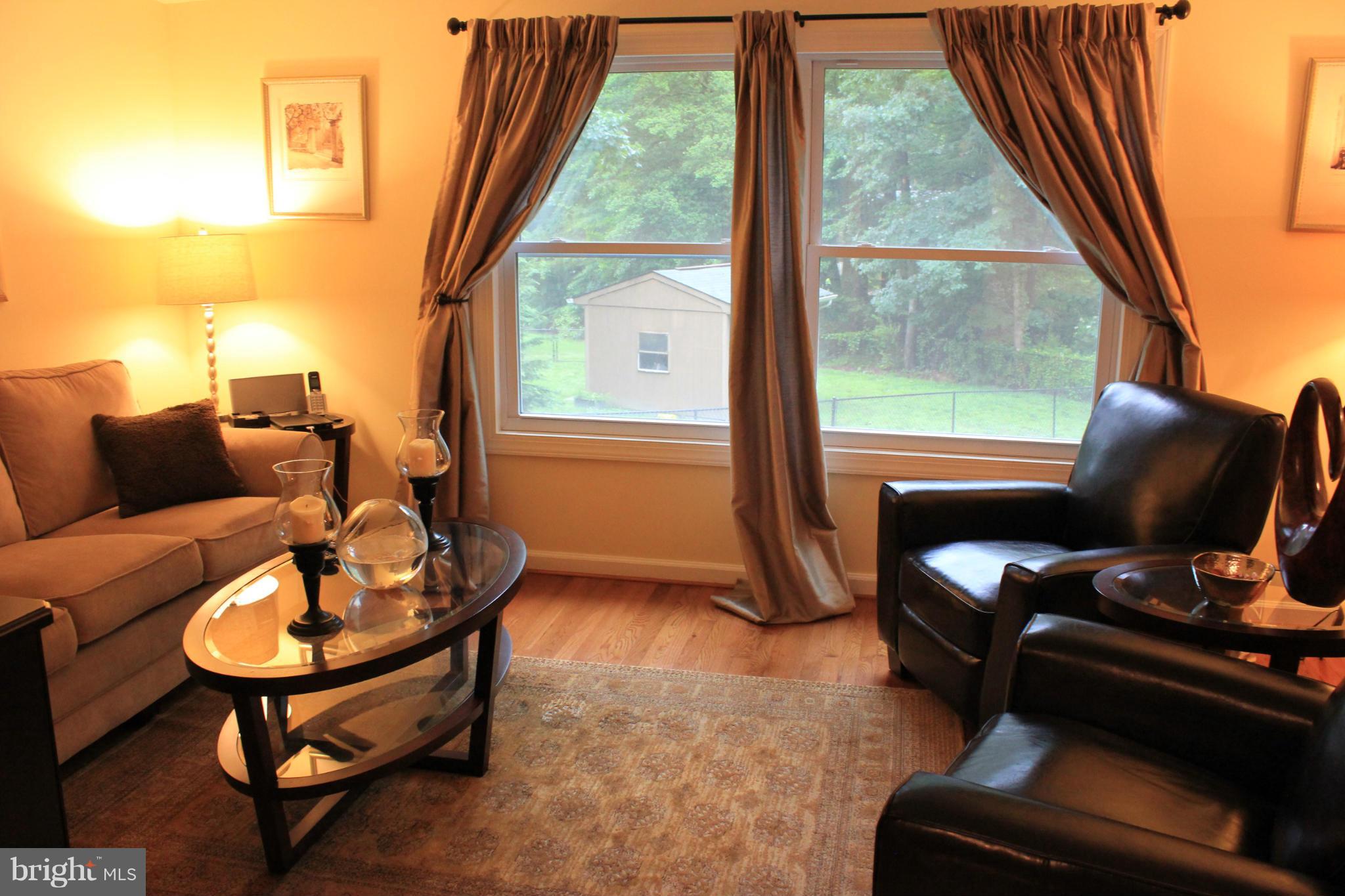 11602 Jester Way Dunkirk, MD 20754 - Photo 7 of 23 a living room with furniture and a window