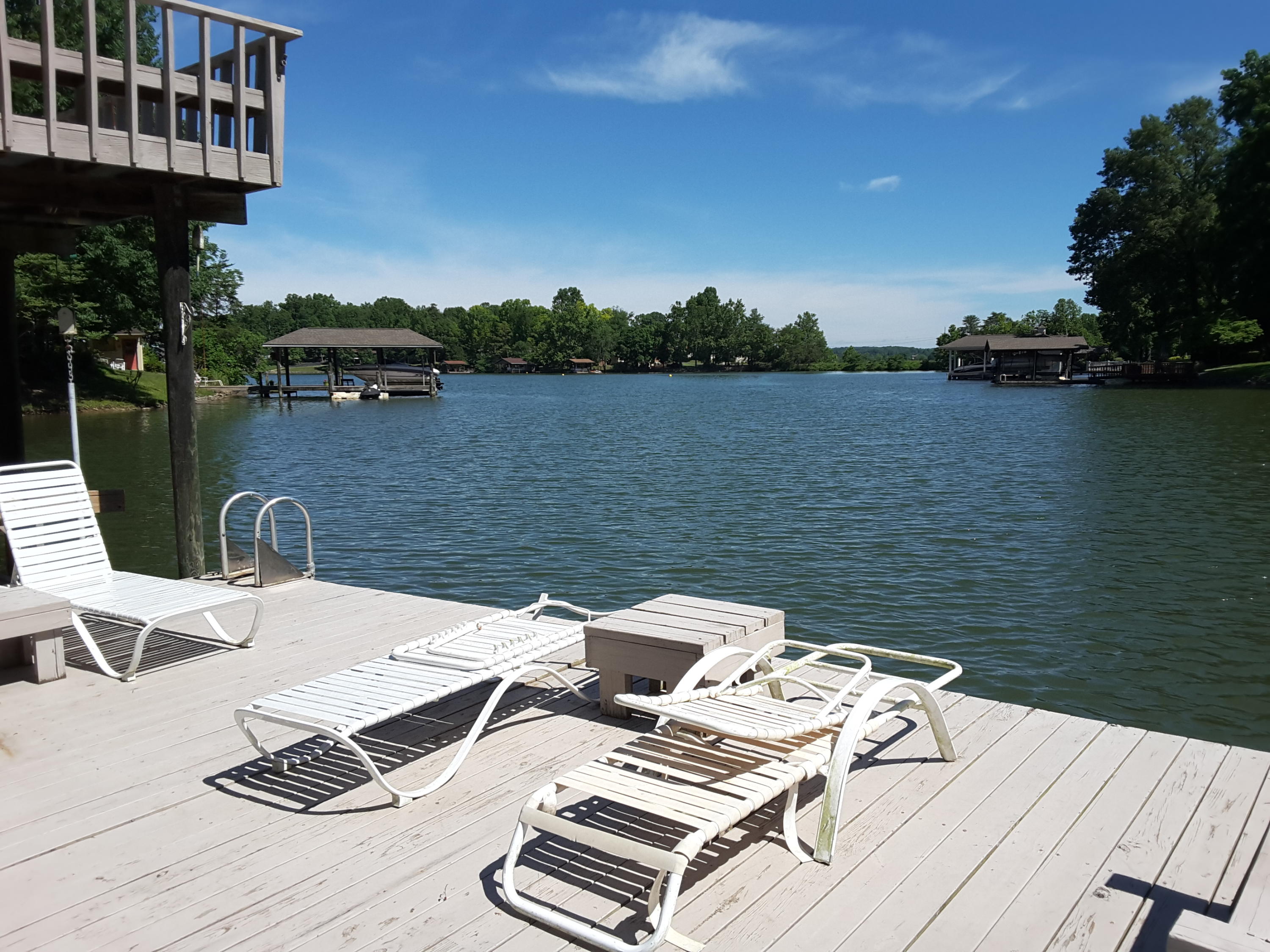 645 Highland Lake Road Union Hall, VA 24176 - Photo 3 of 14 a view of a table and chairs on the roof deck