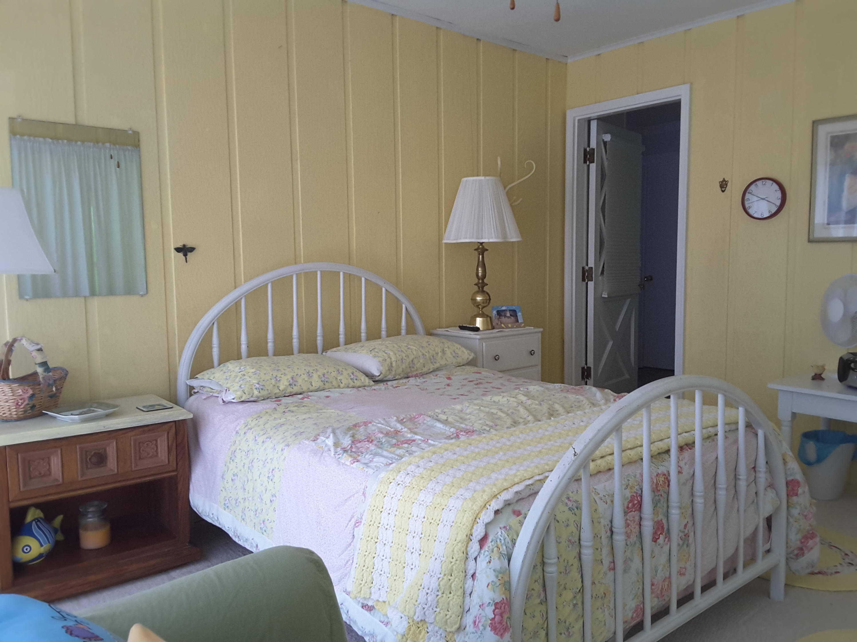 645 Highland Lake Road Union Hall, VA 24176 - Photo 9 of 14 a bedroom with a bed and a table