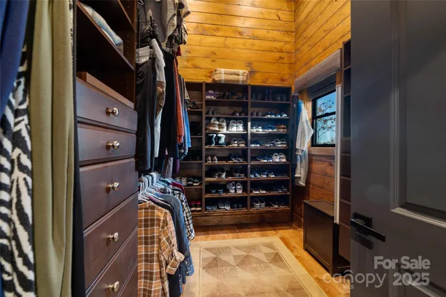 a kitchen with a sink cabinets and stove top oven