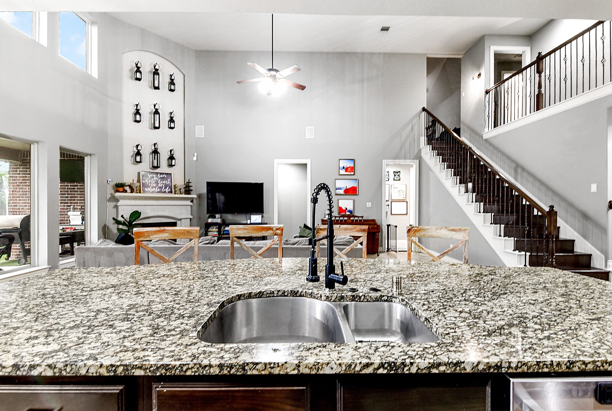 2939 Bobby Jones Road Katy, TX 77494 - Photo 15 of 50 a kitchen with granite countertop a sink and a stove