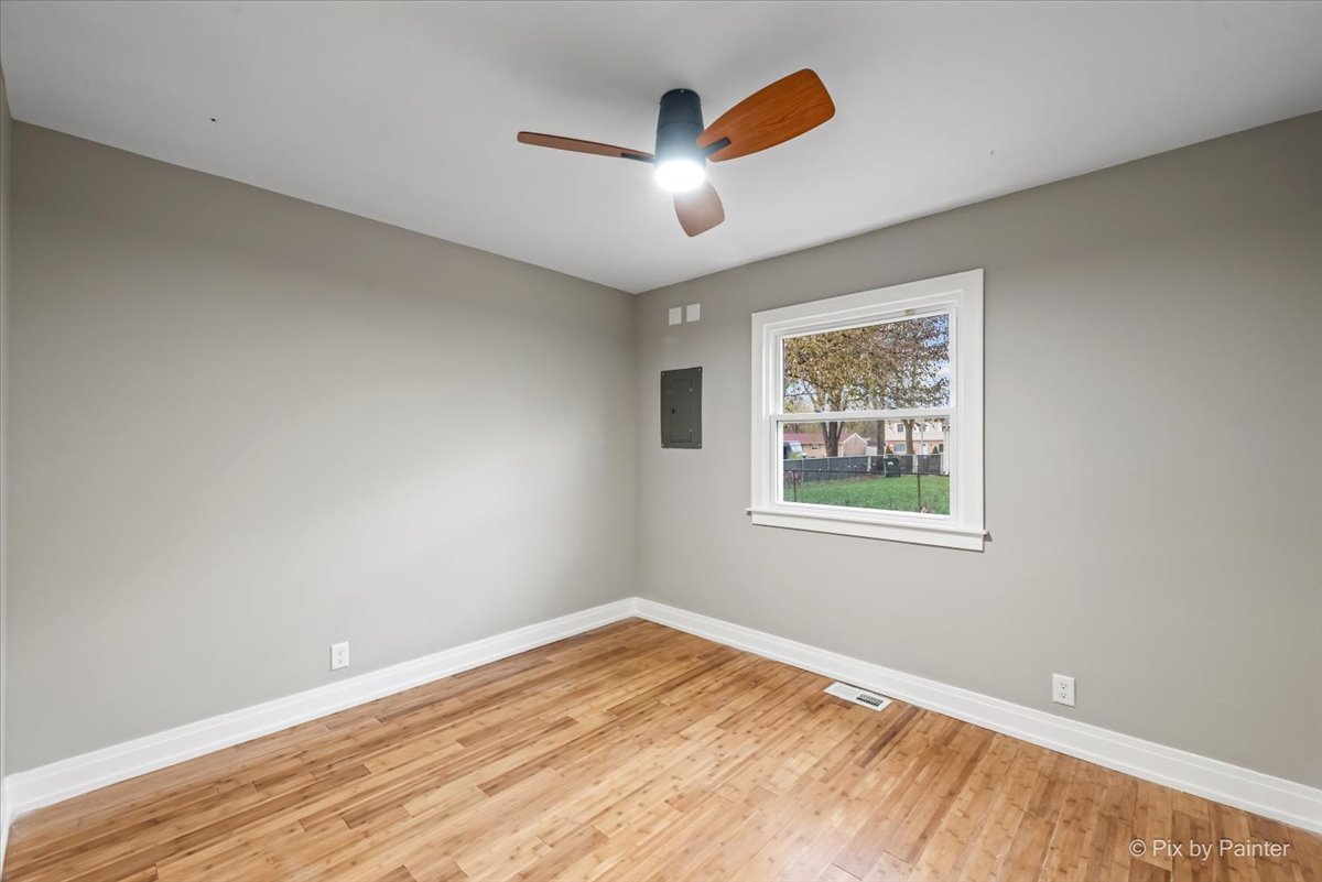 542 East Briarcliff Road Bolingbrook, IL 60440 - Photo 18 of 26 a view of empty room with wooden floor