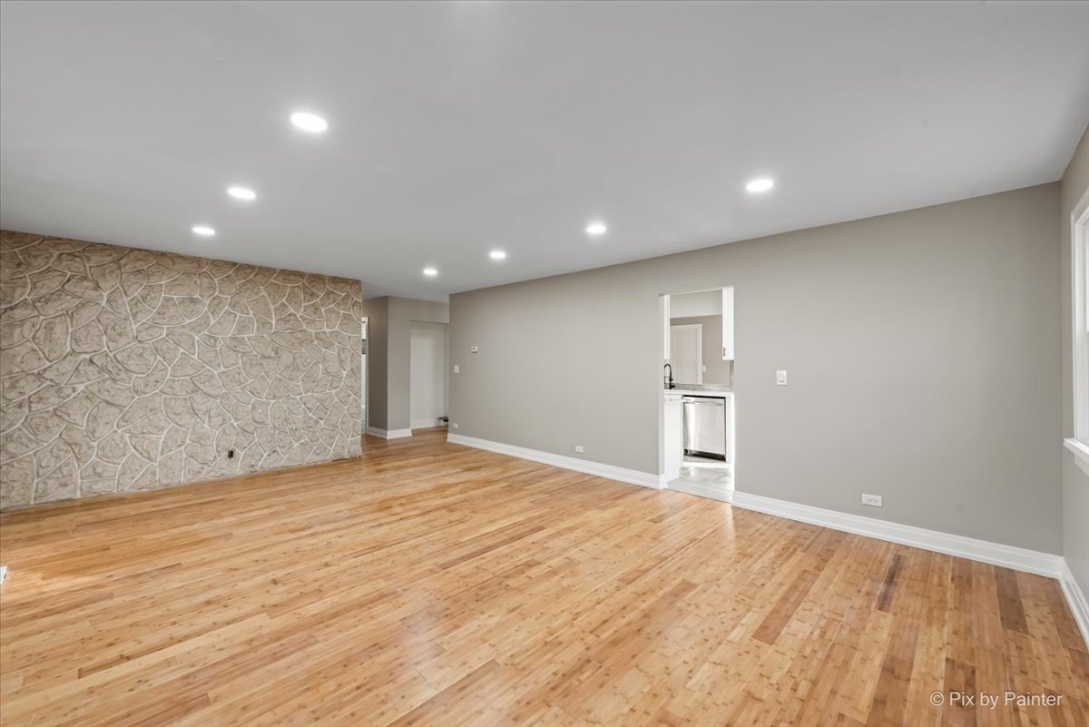 542 East Briarcliff Road Bolingbrook, IL 60440 - Photo 2 of 26 a view of empty room with wooden floor