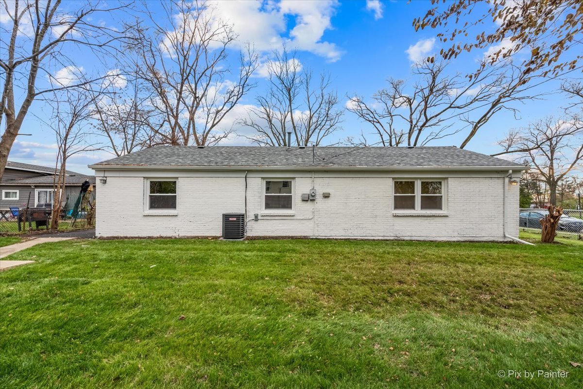 542 East Briarcliff Road Bolingbrook, IL 60440 - Photo 23 of 26 a view of a house with a backyard