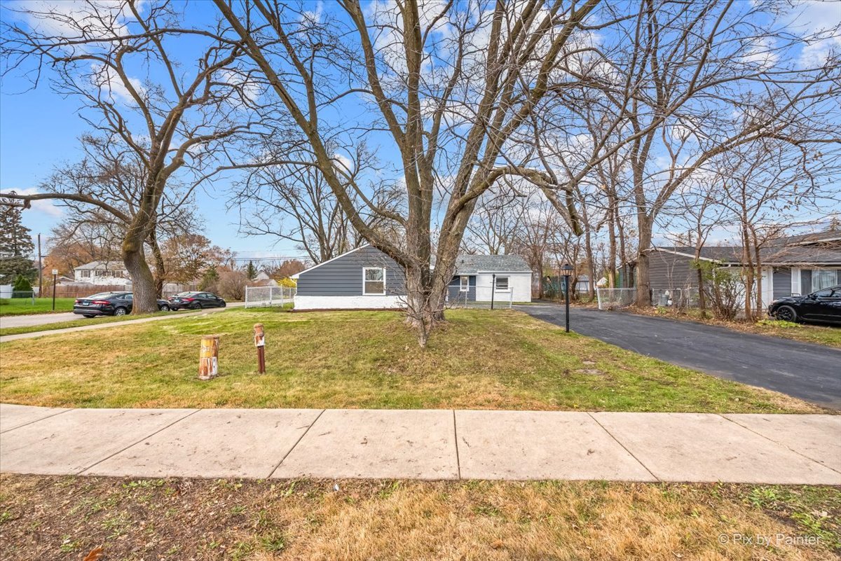 542 East Briarcliff Road Bolingbrook, IL 60440 - Photo 24 of 26 a view of road with trees