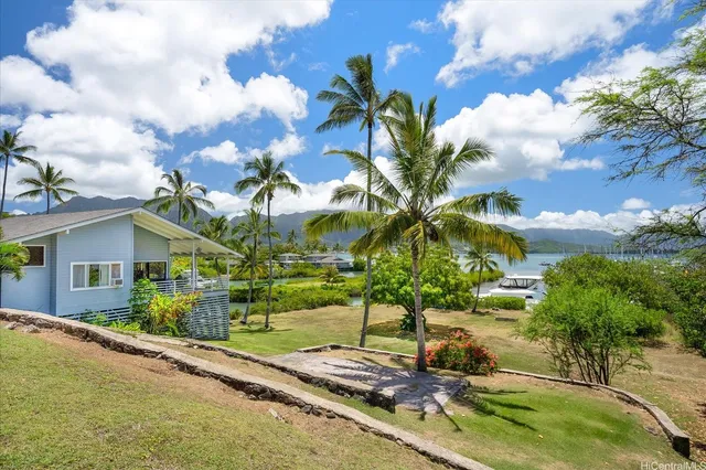 a view of a houses with a yard
