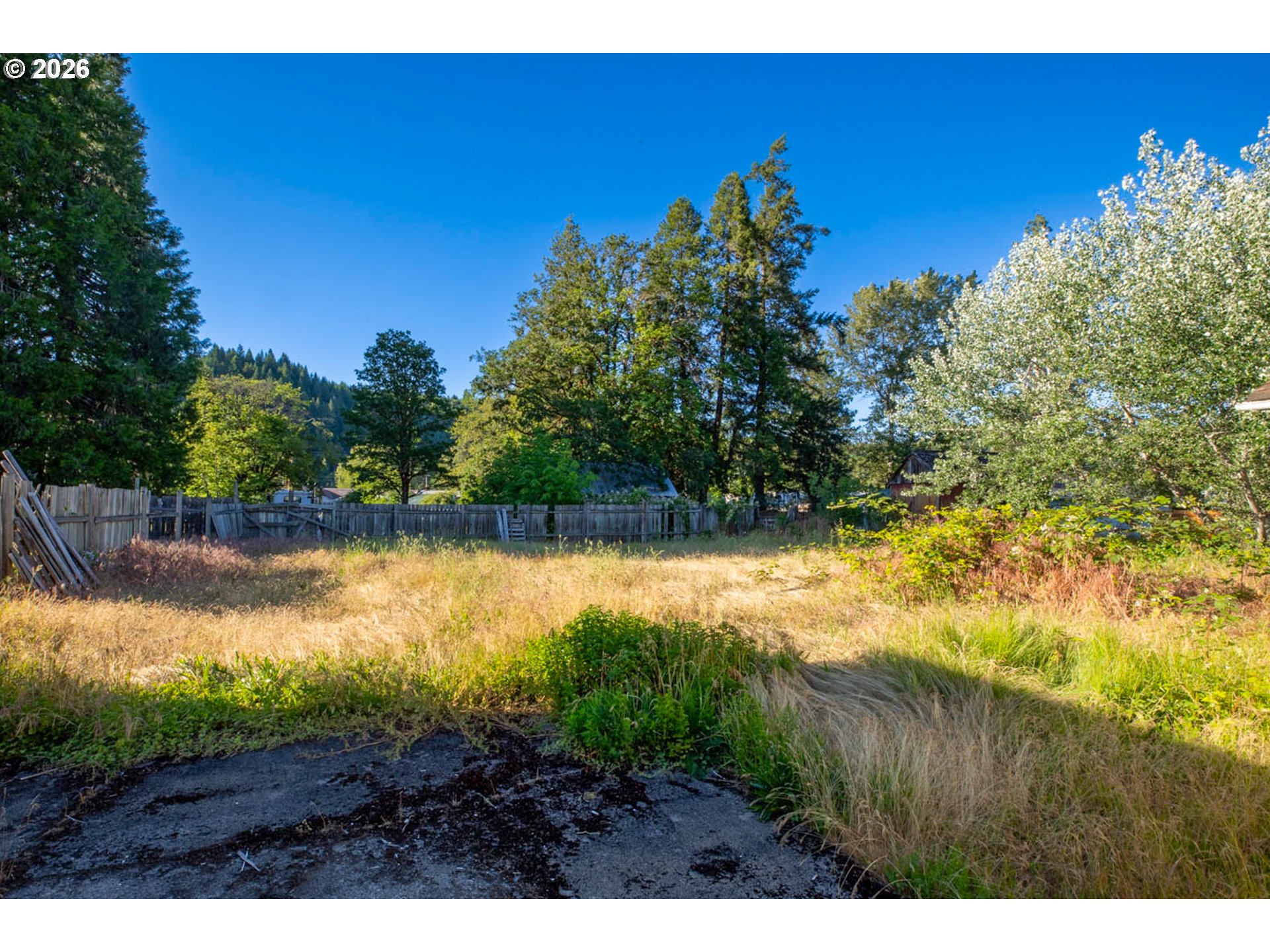 47433 School Street Oakridge, OR 97463 - Photo 14 of 16 a view of a lake with outdoor space