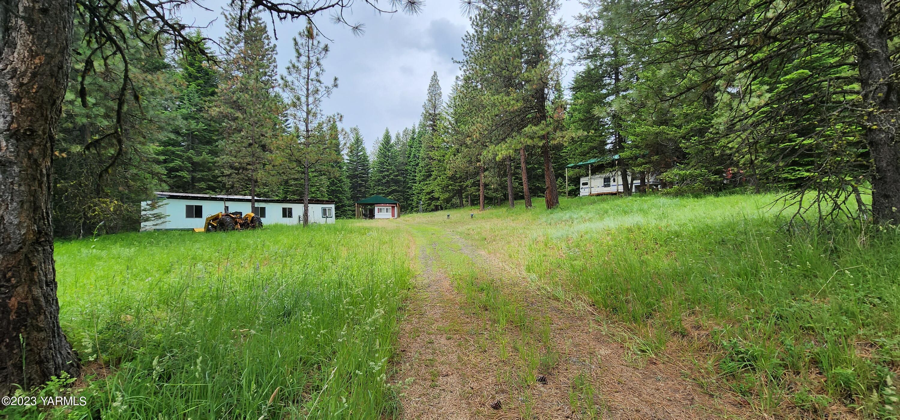384 Cody Road Anatone, WA 99401 - Photo 28 of 33 a view of a backyard with a garden